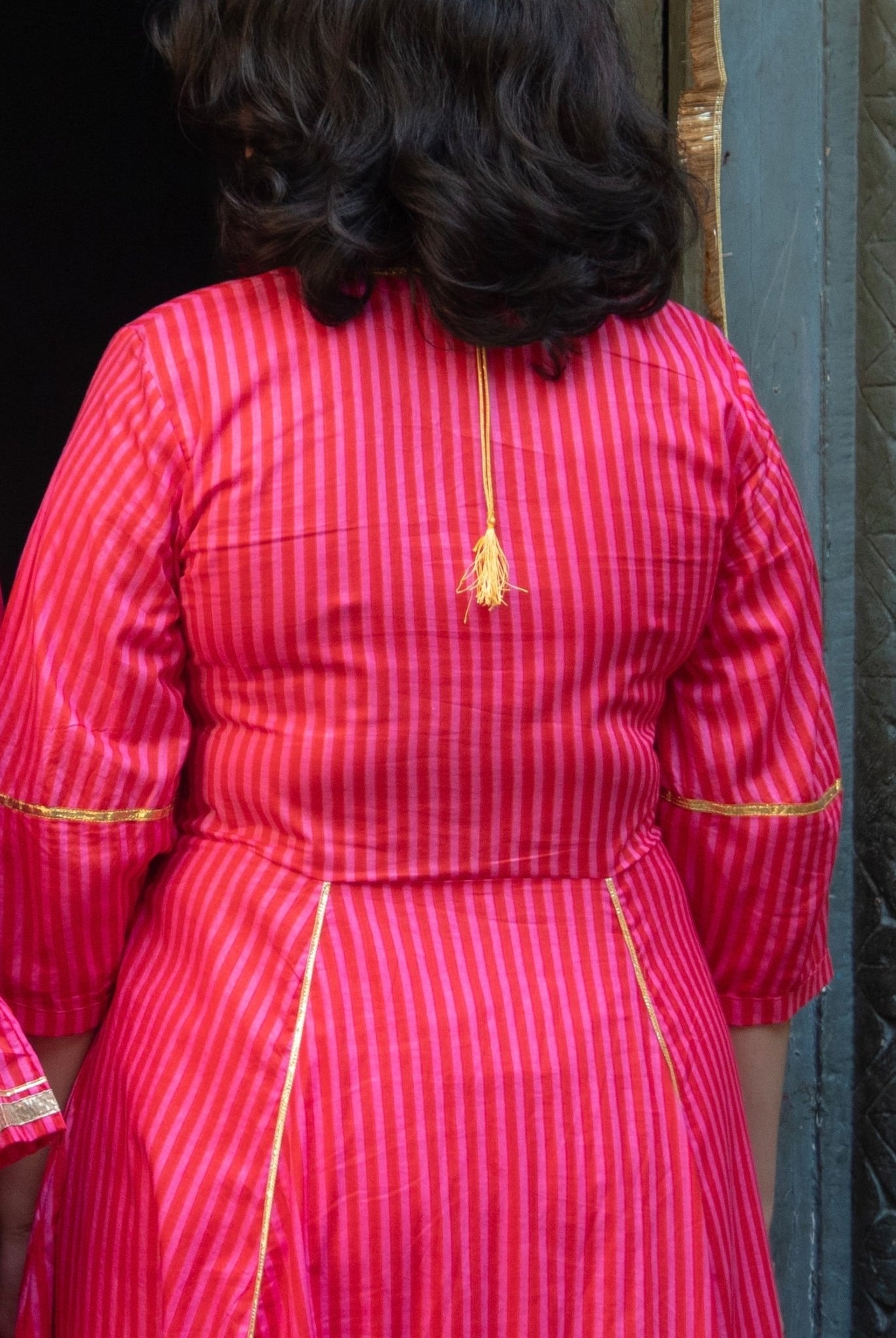 Anaaro - fuschia pink Bagdi dress in 100% striped cotton with hand embroidered gota flowers and sequins. - CiceroniDressAnaaro