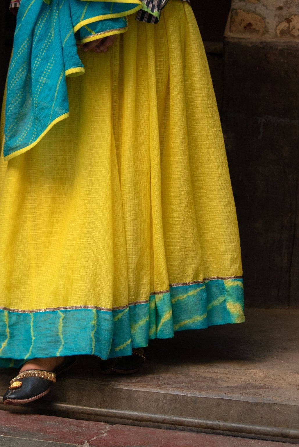 Anaaro - lime yellow Khara panelled skirt in solid cotton kota doria with tie and dye leheriya border - CiceroniSkirtAnaaro