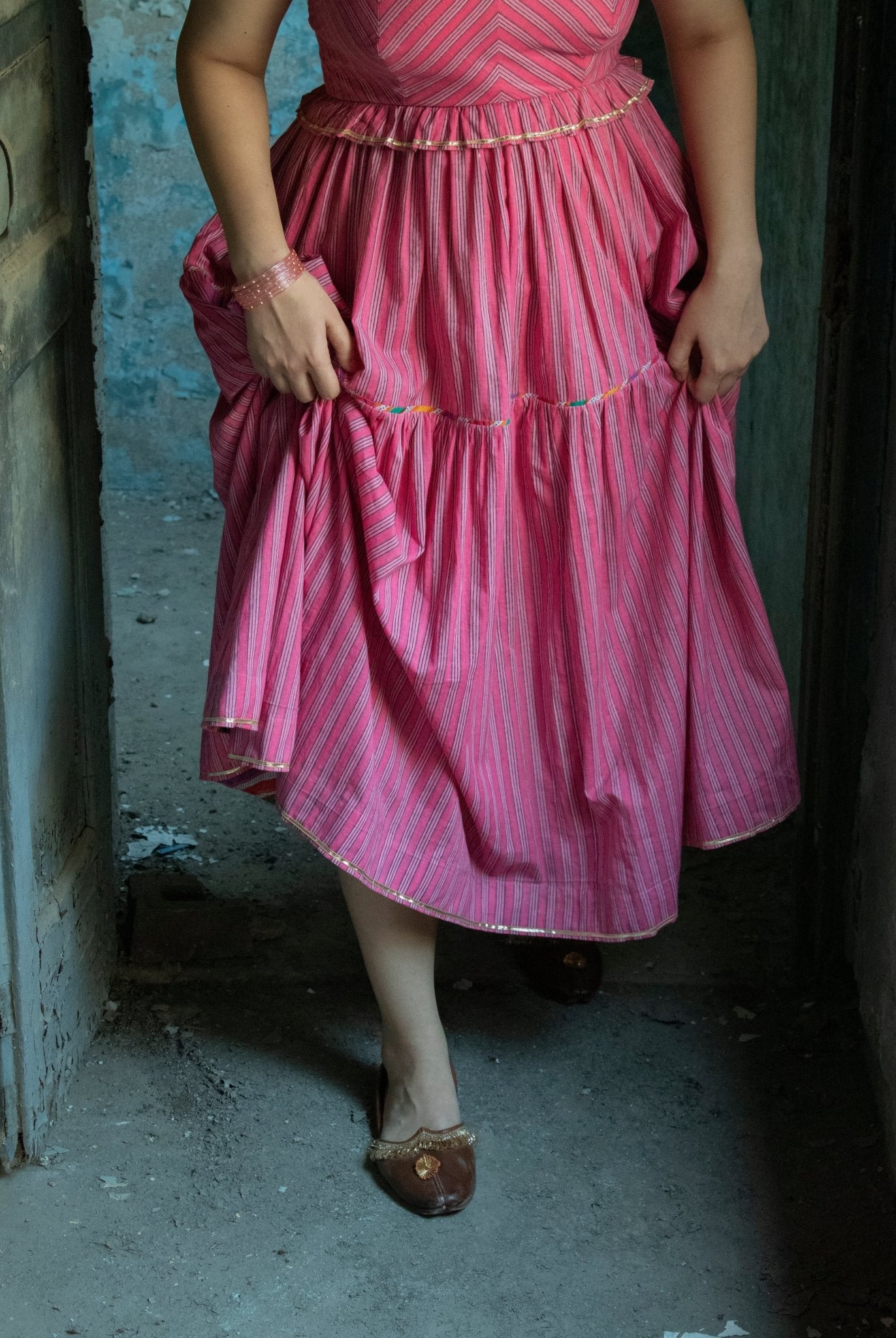 Anaaro - pink kanchli strappy dress in hand block print stripes with multicoloured piping detail - CiceroniDressAnaaro