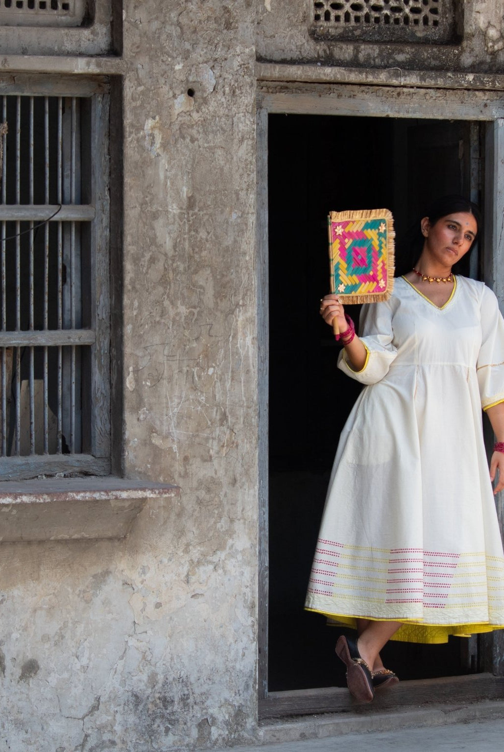 Anaaro - white Bagdi dress in 100% cotton with neon hand block print border and contrasting piping - CiceroniDressAnaaro