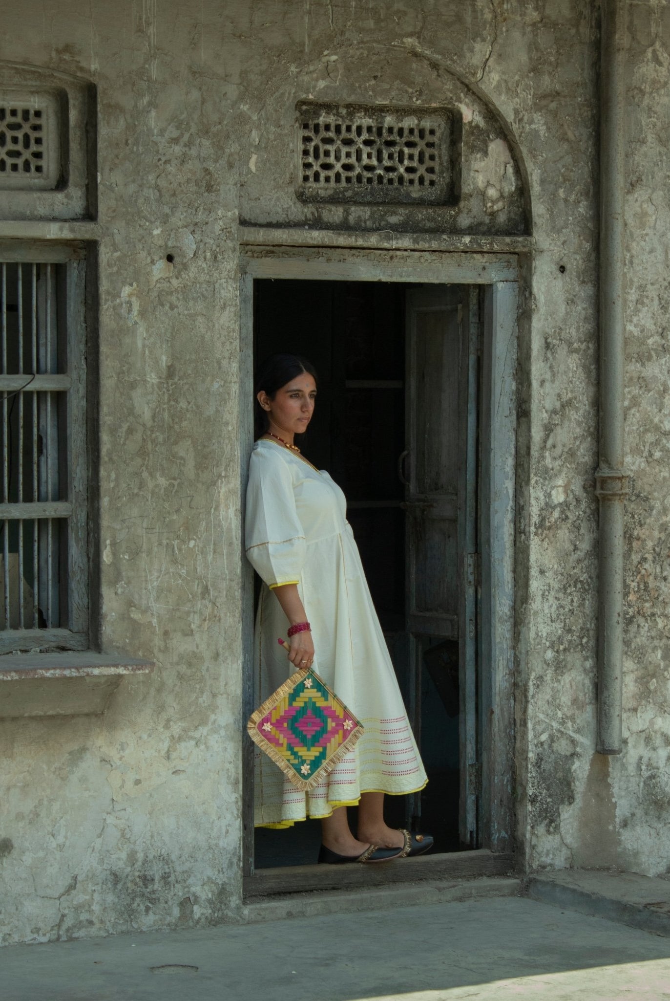 Anaaro - white Bagdi dress in 100% cotton with neon hand block print border and contrasting piping - CiceroniDressAnaaro