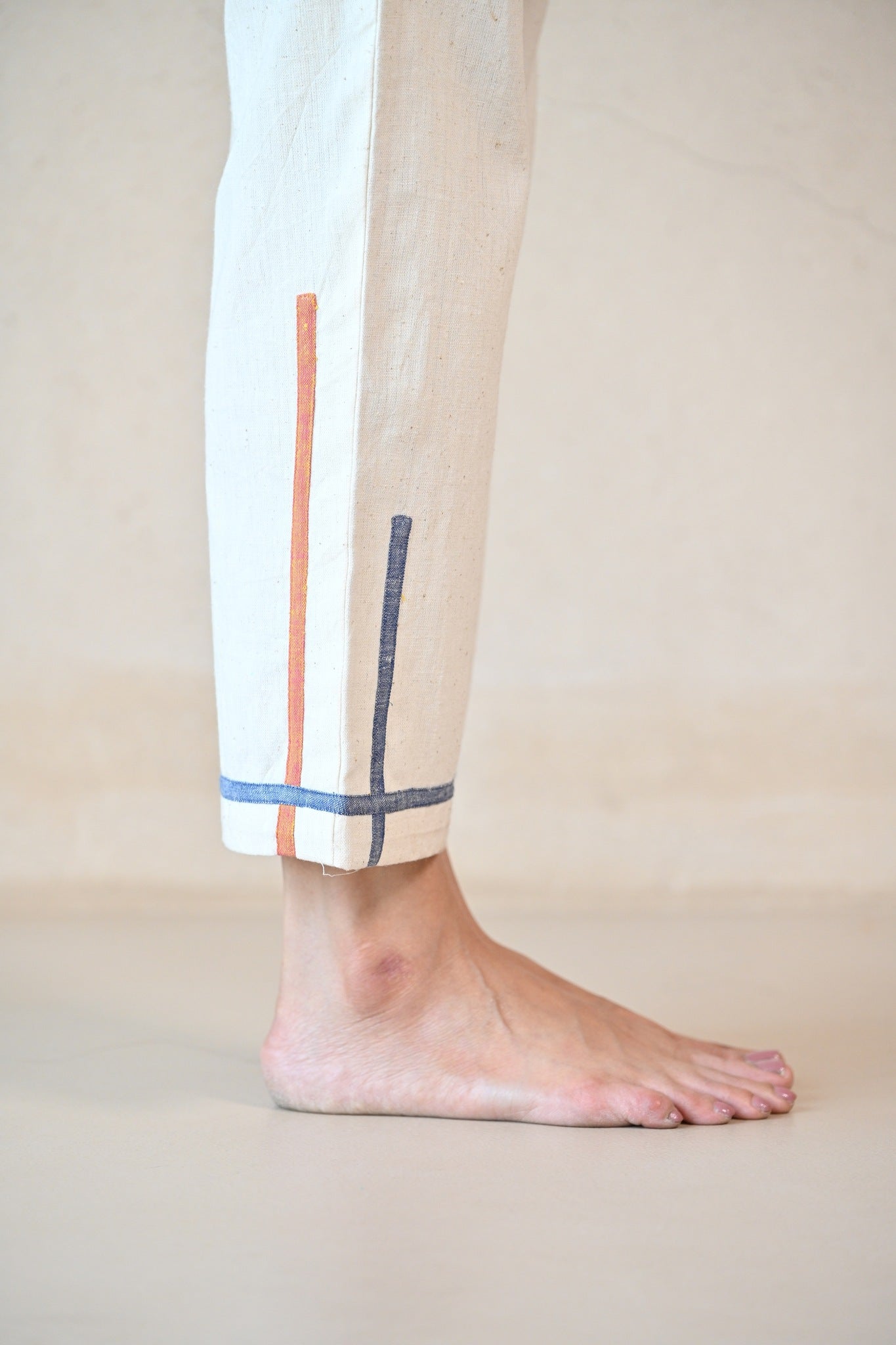 Straight Cut Pant with Fabric Detailing at Hem - Natural White - CiceroniPantsRang by Rajvi