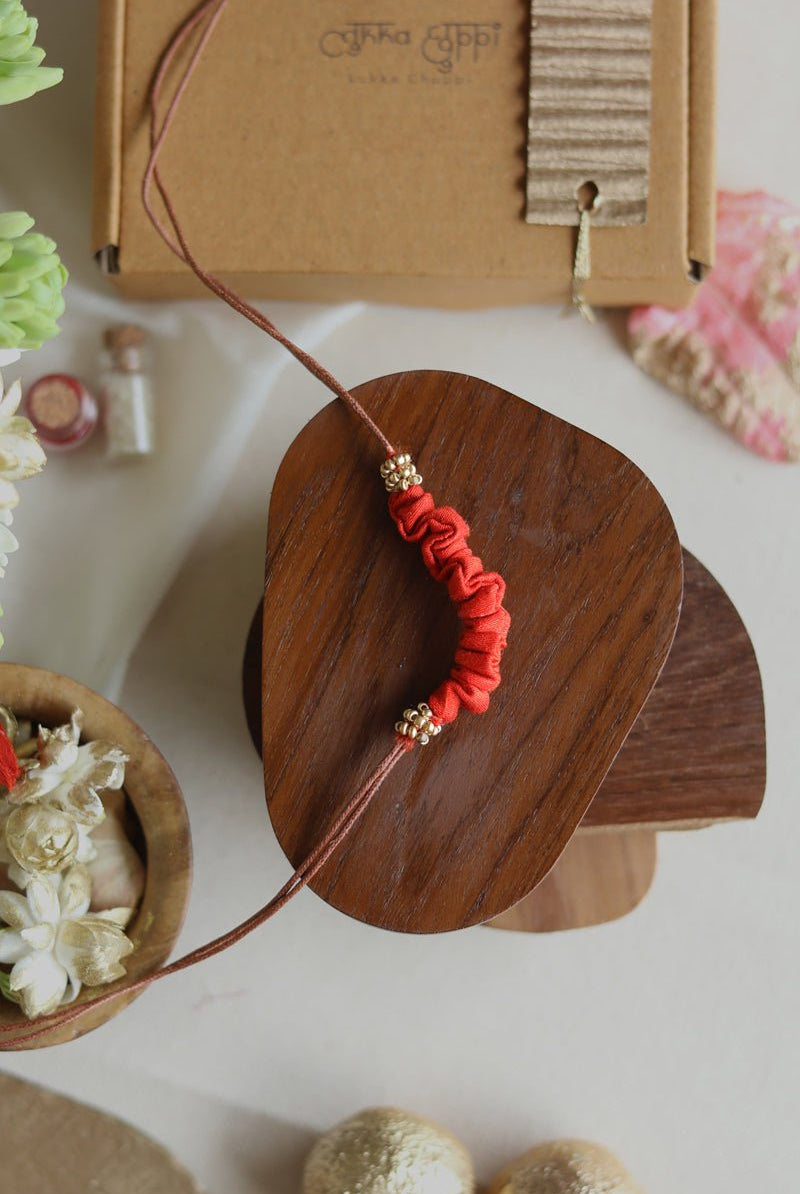 Upcycled Artisanal Rakhi - Orange - CiceroniRakhiLukka Chuppi