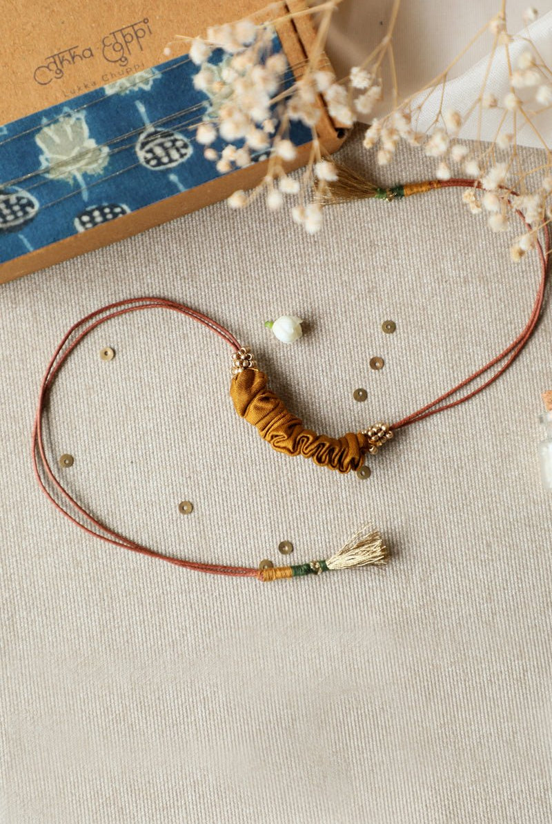 Upcycled Artisanal Rakhi - Yellow - CiceroniRakhiLukka Chuppi
