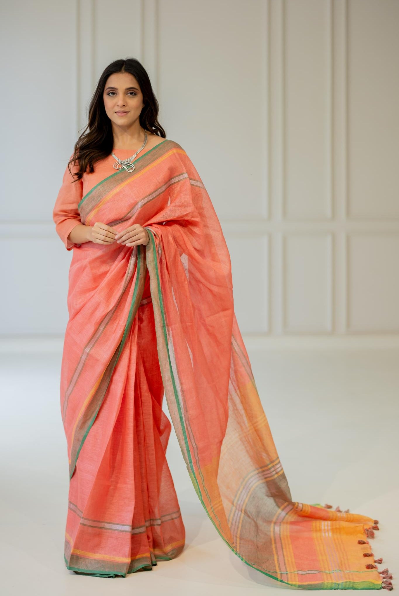 Tropical Apricot Linen Saree - CiceroniSareeSilai Studio