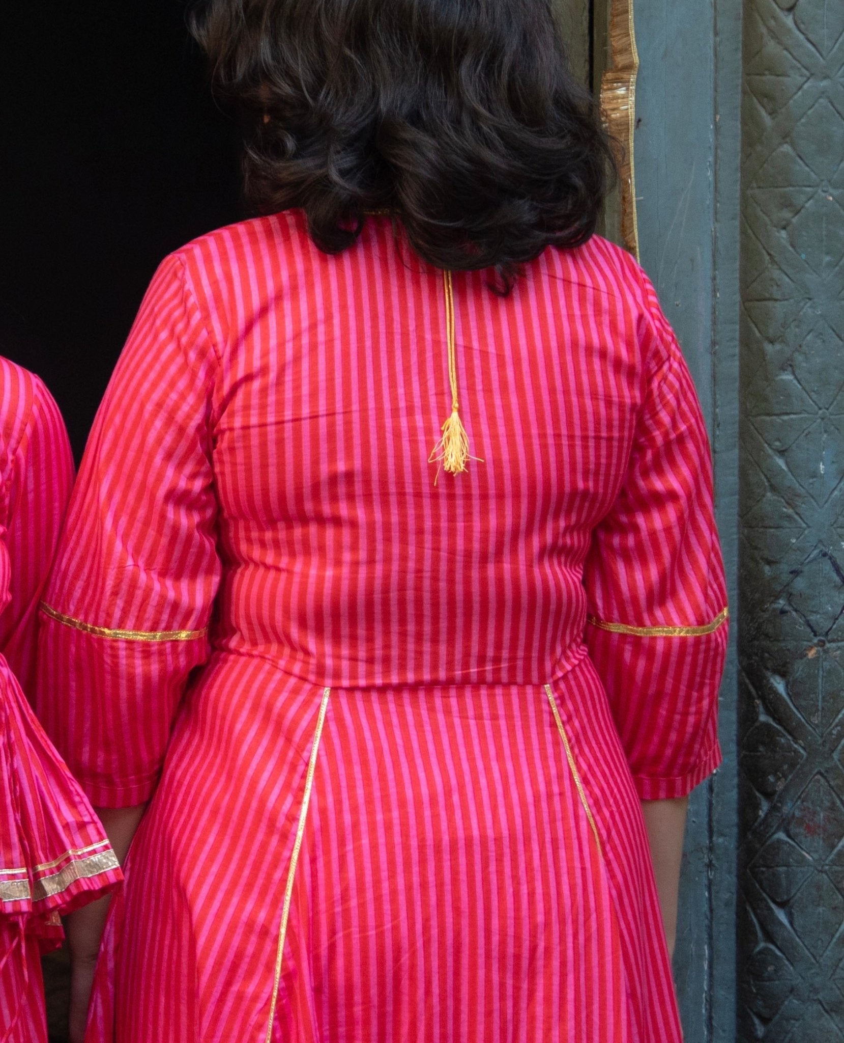 Anaaro - fuschia pink Bagdi dress in 100% striped cotton with hand embroidered gota flowers and sequins. - CiceroniDressAnaaro