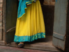 Anaaro - lime yellow Khara panelled skirt in solid cotton kota doria with tie and dye leheriya border - CiceroniSkirtAnaaro