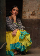 Anaaro - lime yellow Khara panelled skirt in solid cotton kota doria with tie and dye leheriya border - CiceroniSkirtAnaaro