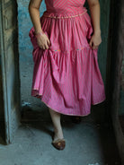 Anaaro - pink kanchli strappy dress in hand block print stripes with multicoloured piping detail - CiceroniDressAnaaro