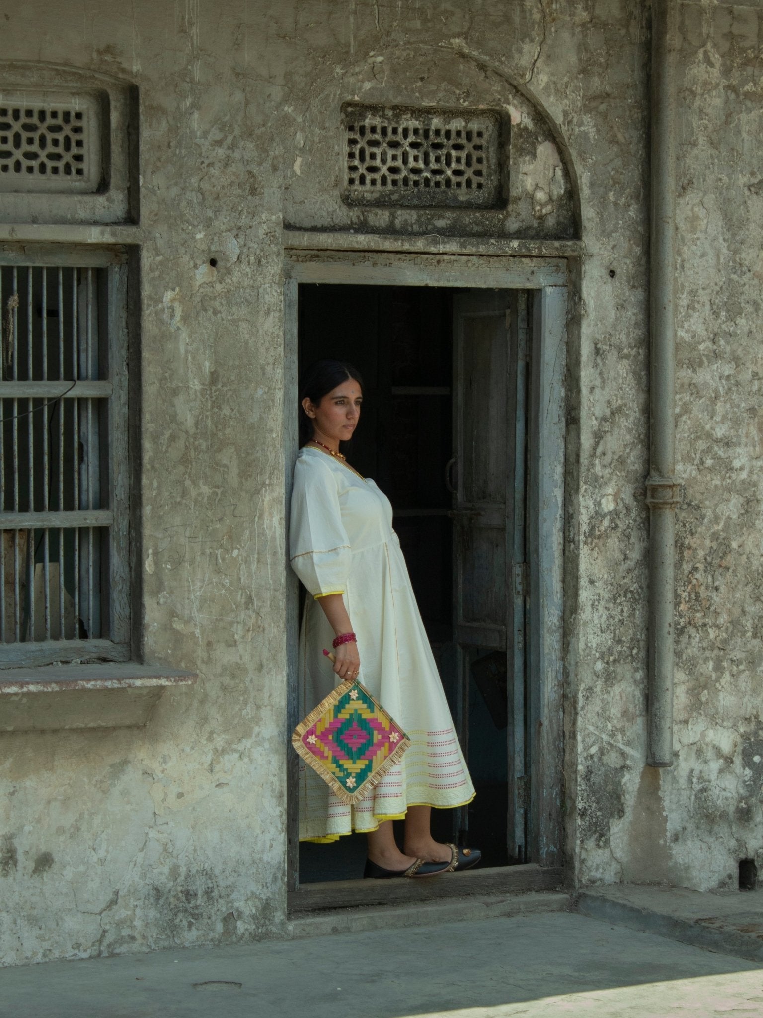 Anaaro - white Bagdi dress in 100% cotton with neon hand block print border and contrasting piping - CiceroniDressAnaaro