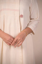 Tunic, Jacket style with Pleated texture detail and Hand embroidered button - CiceroniTunicsRang by Rajvi