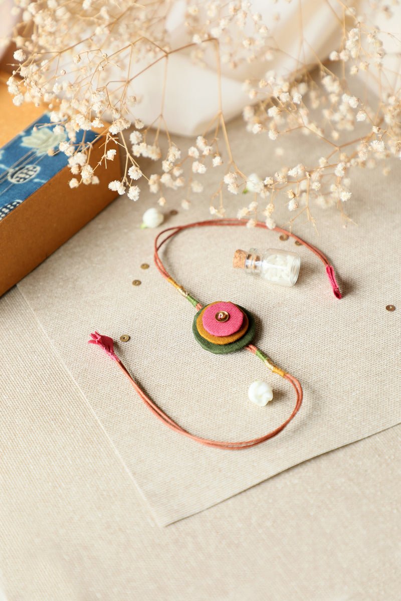 Upcycled Artisanal Rakhi - Mustard, Green and Pink - CiceroniRakhiLukka Chuppi