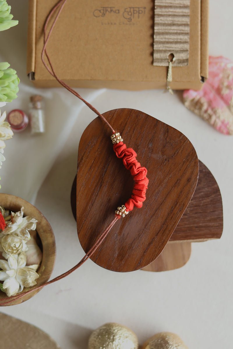 Upcycled Artisanal Rakhi - Orange - CiceroniRakhiLukka Chuppi