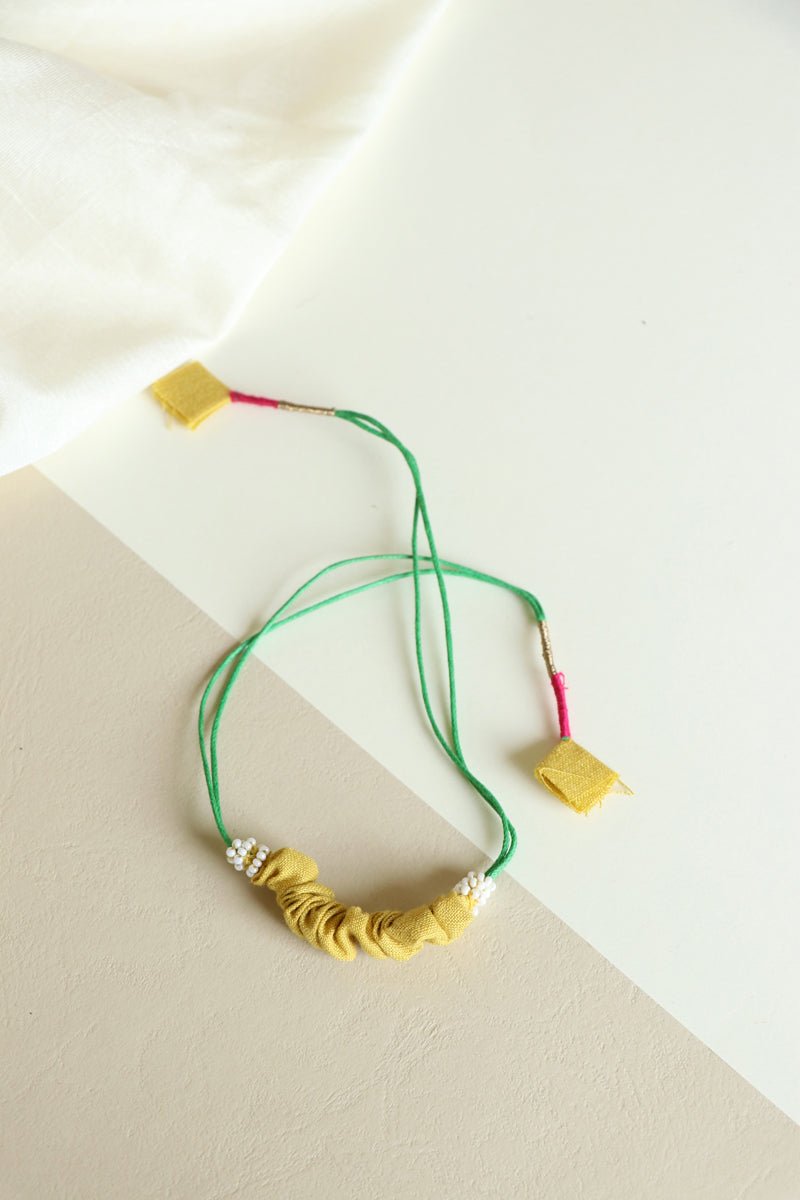 Upcycled Artisanal Rakhi - Yellow - CiceroniRakhiLukka Chuppi