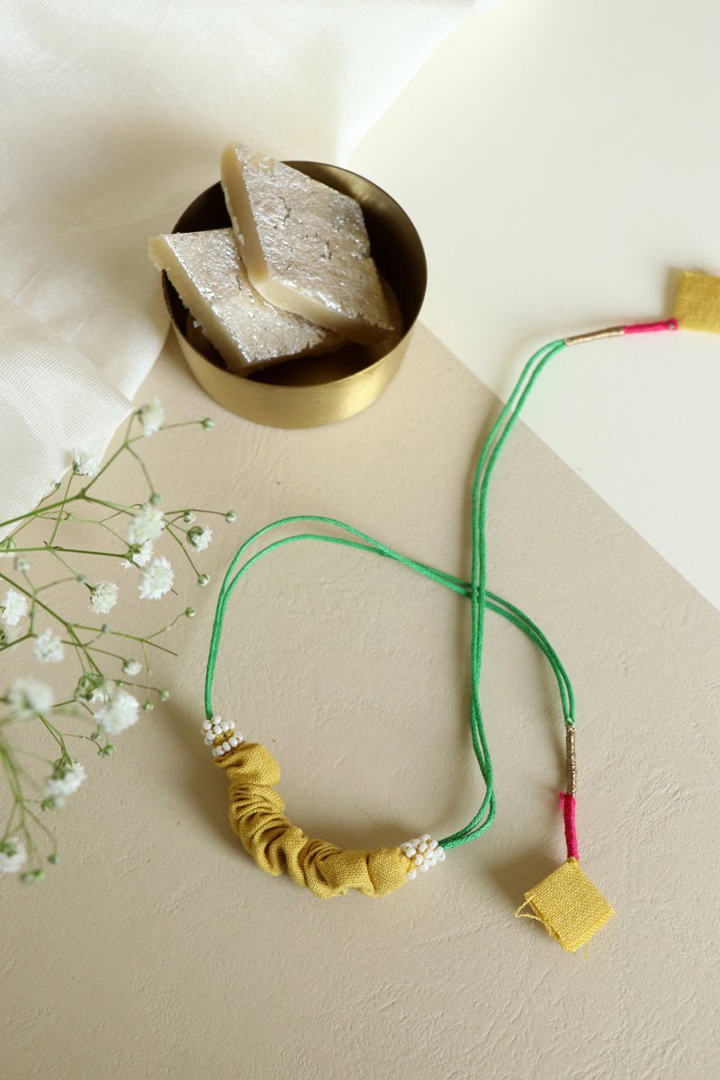 Upcycled Artisanal Rakhi - Yellow - CiceroniRakhiLukka Chuppi