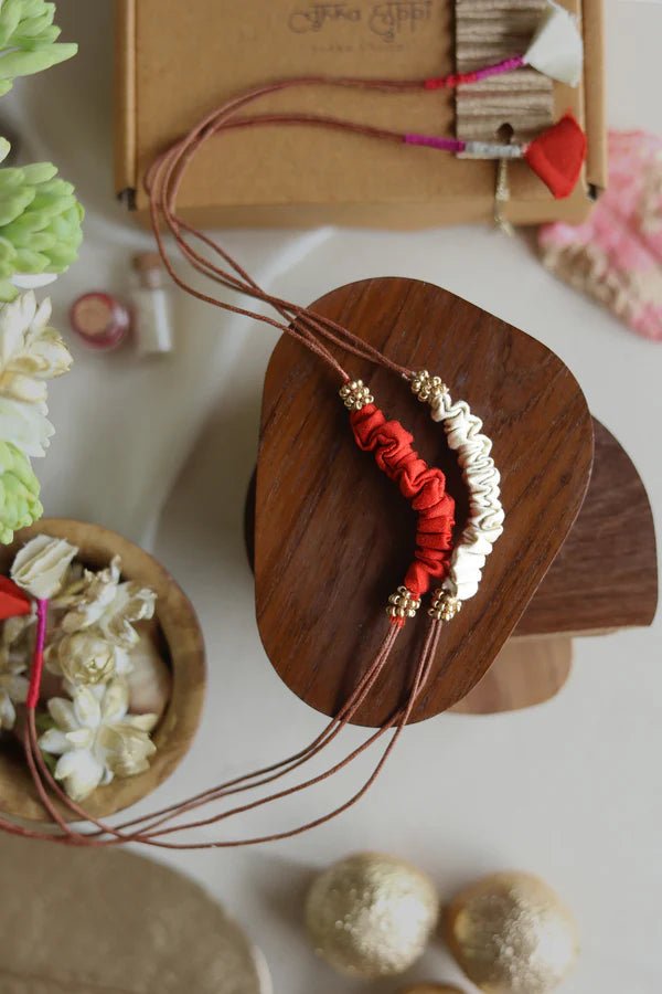 Upcycled Rakhi (Set of 2) - Orange and White - CiceroniRakhiLukka Chuppi